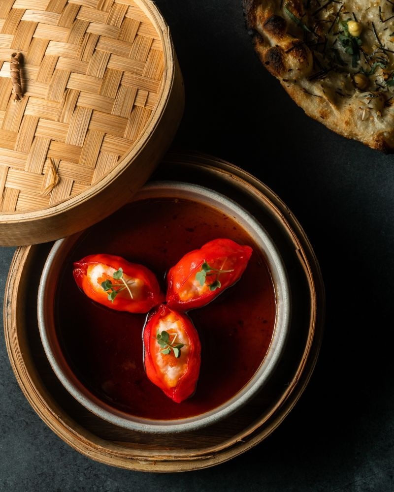 Scallop and prawn pocket har gow in a bamboo steamer at Mama San
