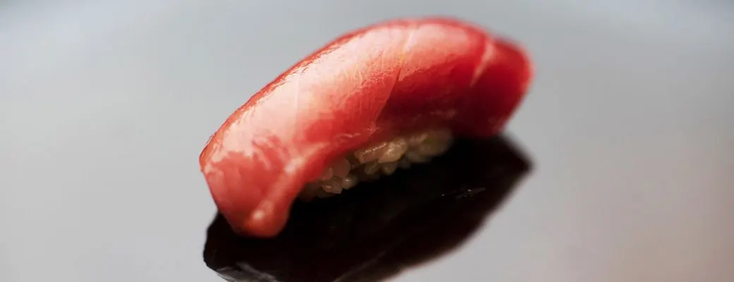 A piece of tuna nigiri at Sushi Arai