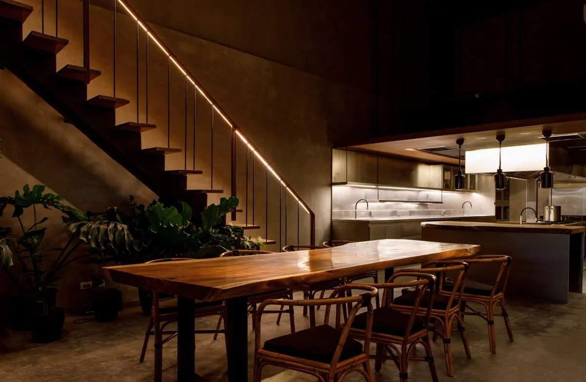The dining room and open kitchen at Toyo Eatery