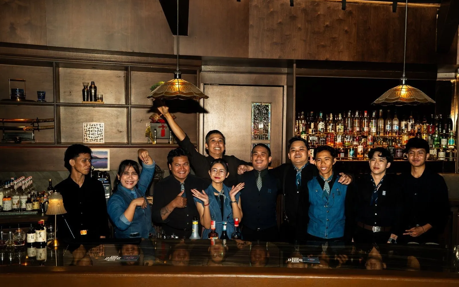 The full AOKU bar team behind the bar.